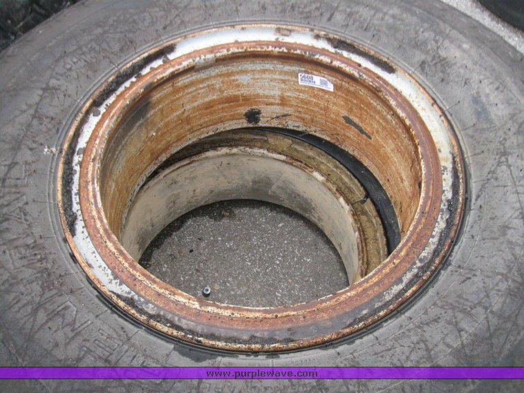 image for item 5608 (3) 11.00-20 tires and wheels