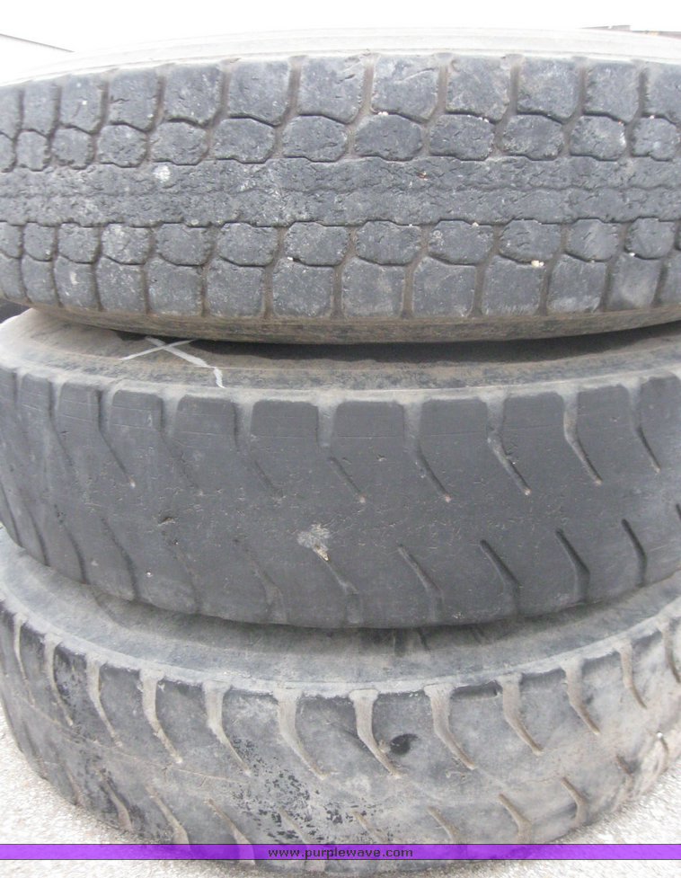 image for item 5610 (3) 11R22.5 tires and wheels