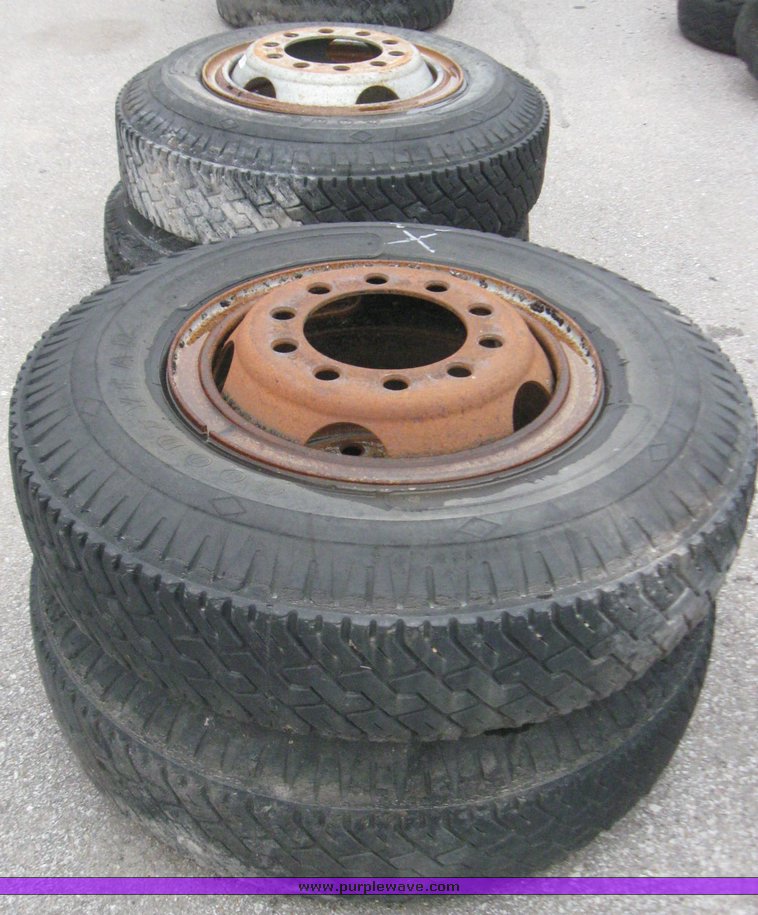 image for item 5611 (4) 10.00-20 tires and wheels