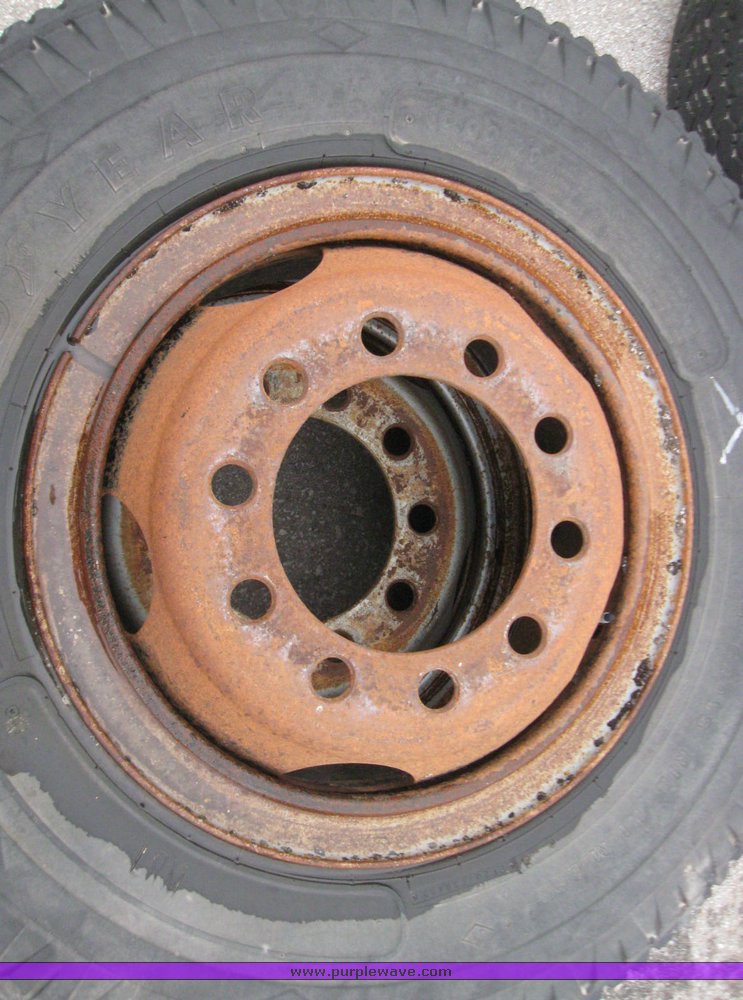 image for item 5611 (4) 10.00-20 tires and wheels