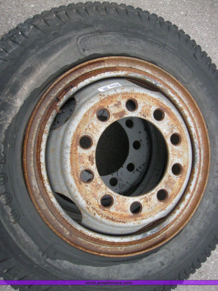 image for item 5611 (4) 10.00-20 tires and wheels