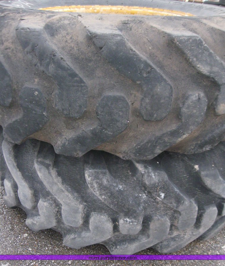 image for item 5613 (2) 14.00-24 tires and wheels