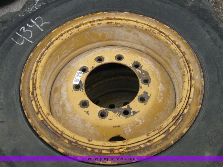 image for item 5613 (2) 14.00-24 tires and wheels