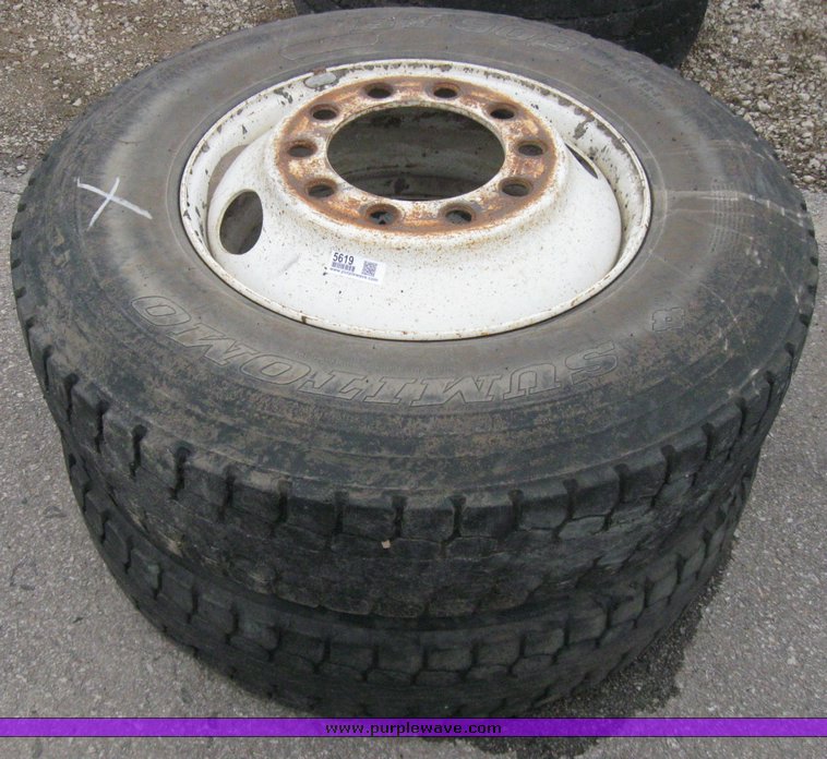image for item 5619 (2) 11R22.5 tires and wheels