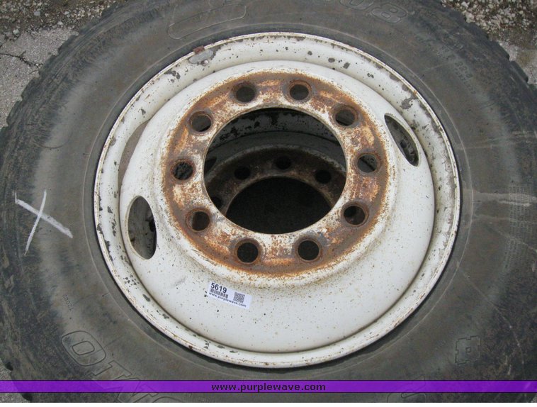 image for item 5619 (2) 11R22.5 tires and wheels