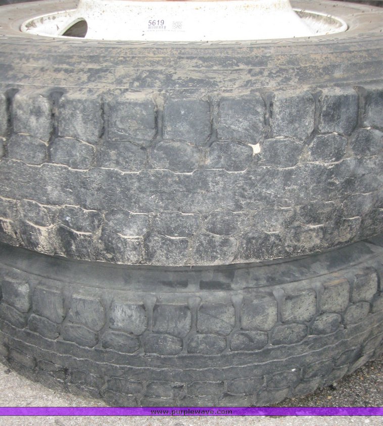 image for item 5619 (2) 11R22.5 tires and wheels