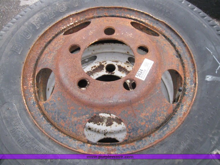 image for item 5624 (4) 7.00-18 tire and wheels