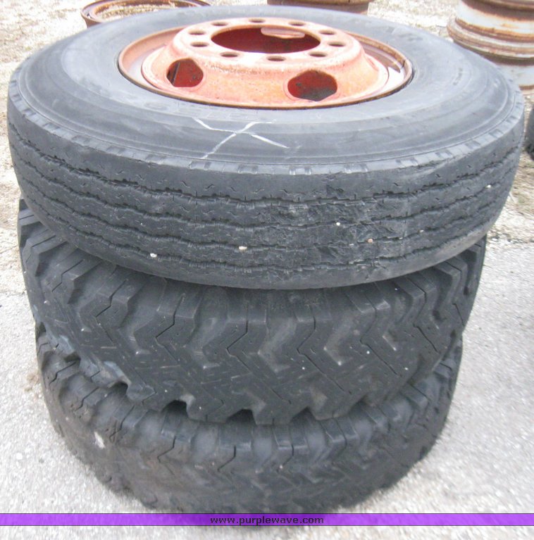 image for item 5646 (3) 10.00-20 tires and wheels