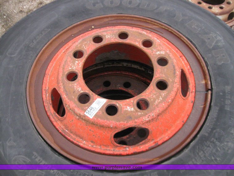 image for item 5646 (3) 10.00-20 tires and wheels