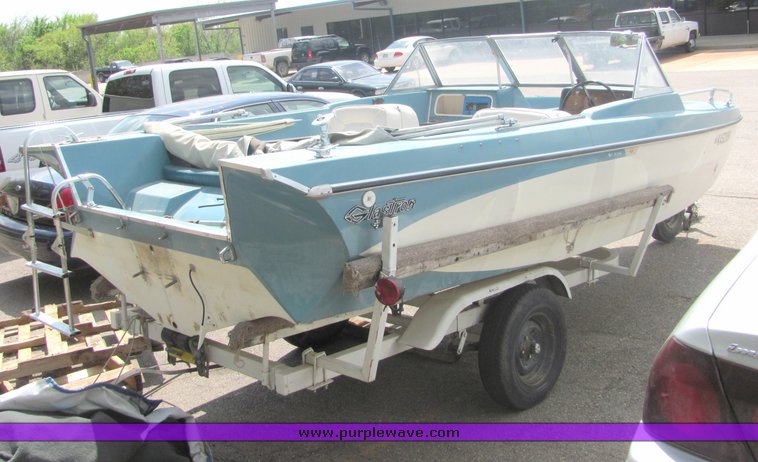 image for item 6075 Glastron 18' tri-hull boat with trailer