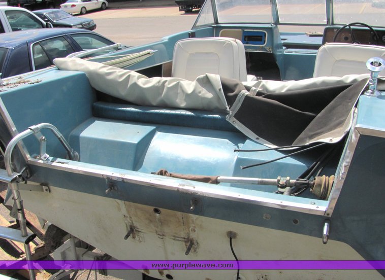 image for item 6075 Glastron 18' tri-hull boat with trailer