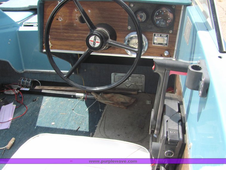 image for item 6075 Glastron 18' tri-hull boat with trailer