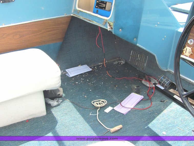 image for item 6075 Glastron 18' tri-hull boat with trailer