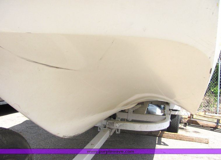 image for item 6075 Glastron 18' tri-hull boat with trailer