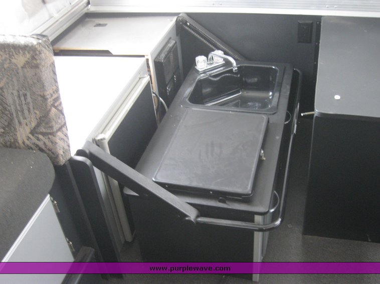 image for item 7858 2008 Fleetwood E3 folding camper trailer