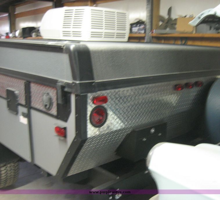 image for item 7858 2008 Fleetwood E3 folding camper trailer