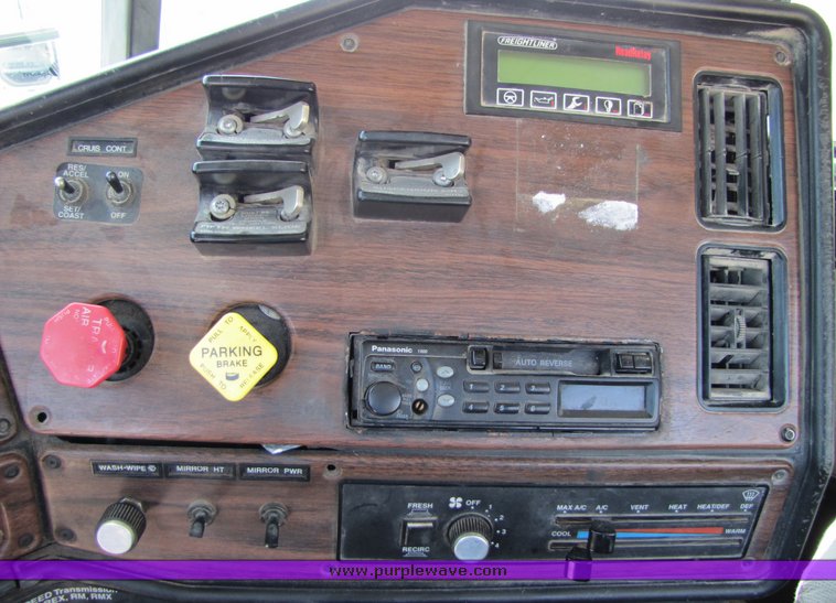 image for item 3040 1999 Freightliner Conventional FLD112 semi truck