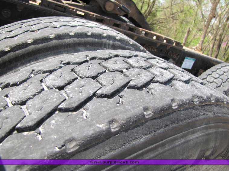 image for item 3040 1999 Freightliner Conventional FLD112 semi truck