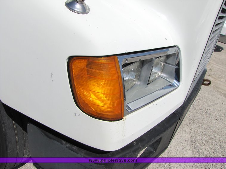 image for item 3040 1999 Freightliner Conventional FLD112 semi truck