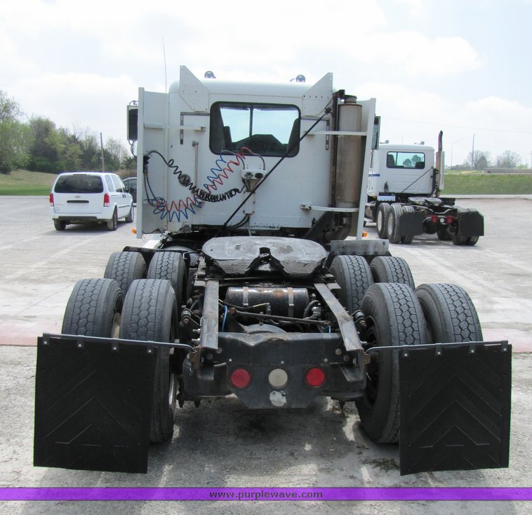 image for item 3053 1999 Freightliner Conventional FLD112 semi truck