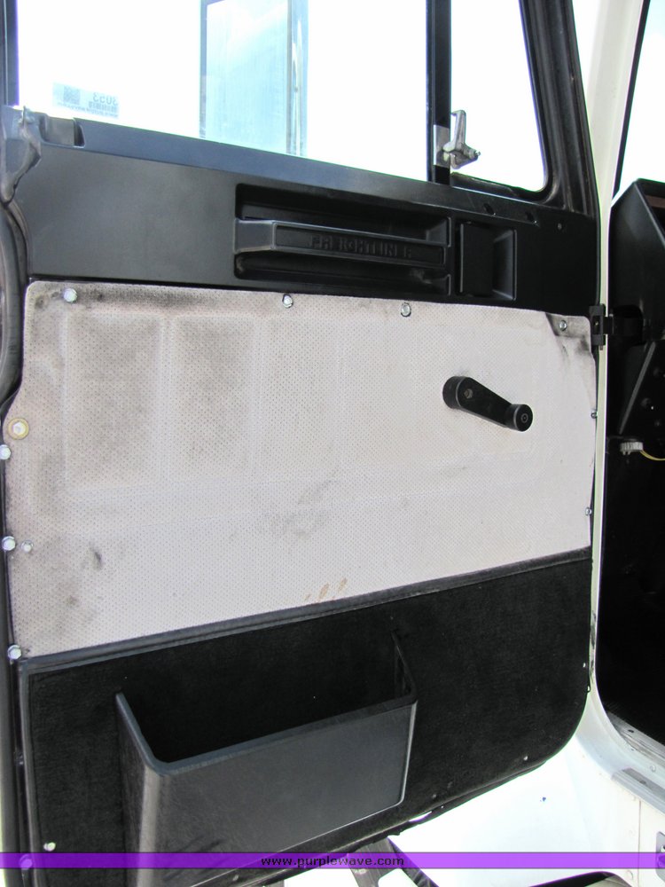 image for item 3053 1999 Freightliner Conventional FLD112 semi truck