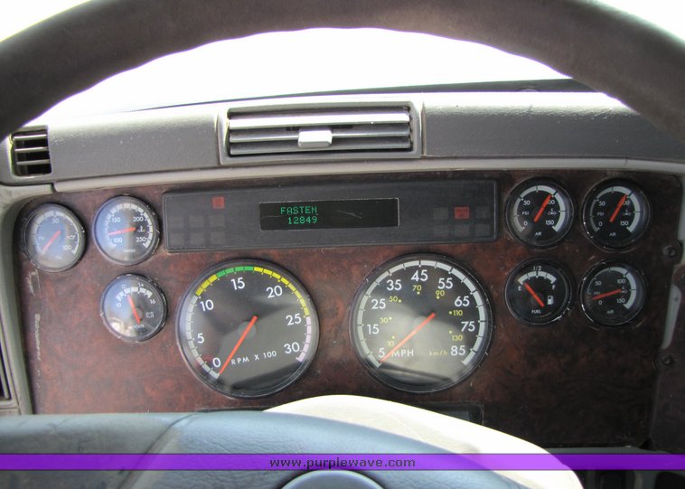 image for item 3057 1998 Freightliner Conventional FLC120 semi truck