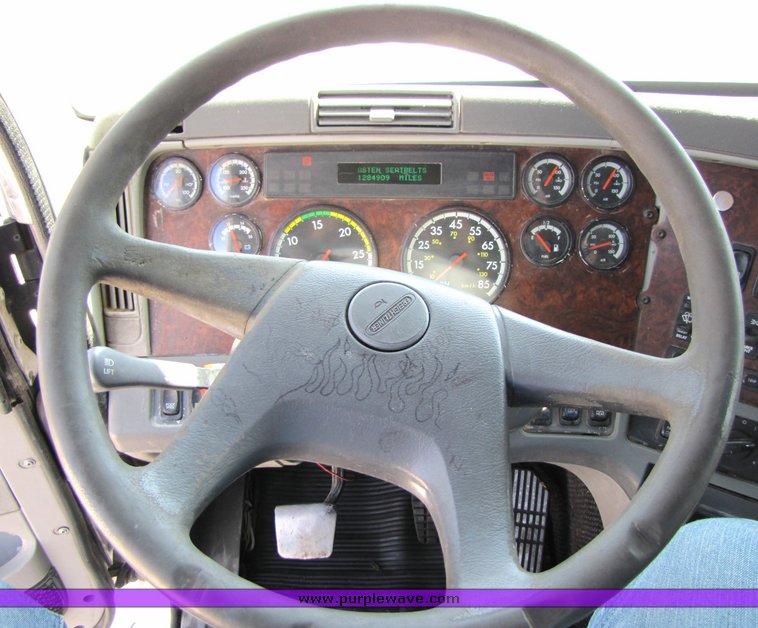 image for item 3057 1998 Freightliner Conventional FLC120 semi truck