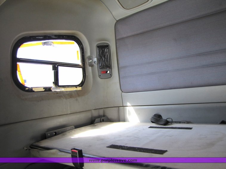 image for item 3057 1998 Freightliner Conventional FLC120 semi truck