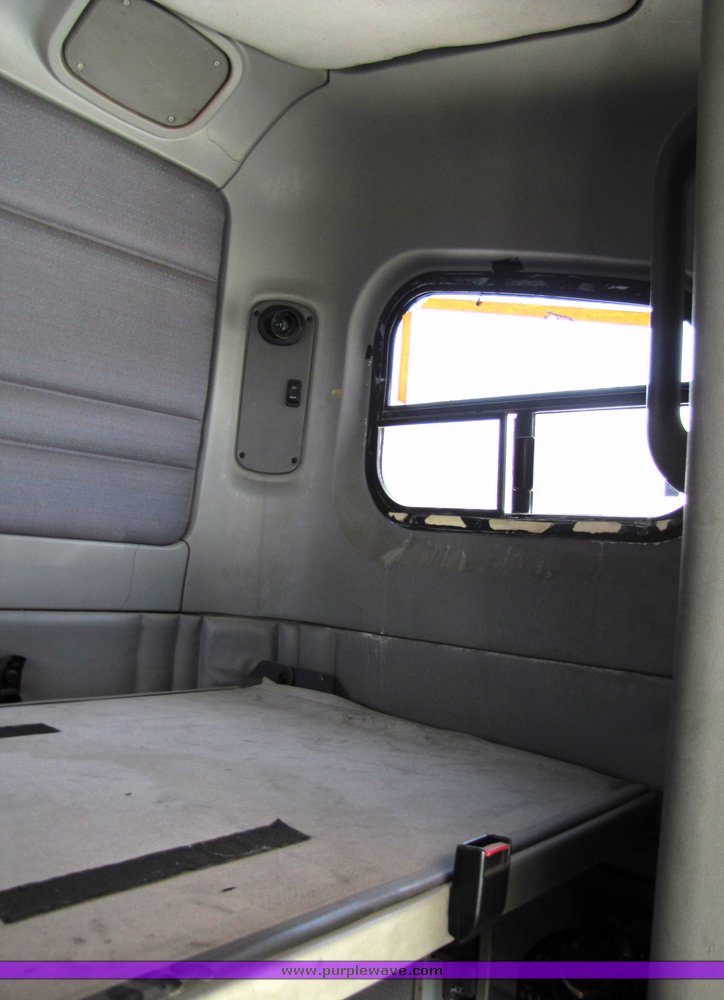 image for item 3057 1998 Freightliner Conventional FLC120 semi truck