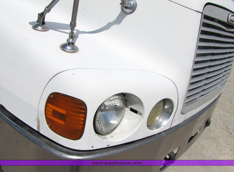 image for item 3057 1998 Freightliner Conventional FLC120 semi truck