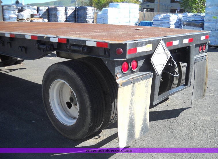 image for item 8100 1991 International 4900 4x2 single axle truck and trailer