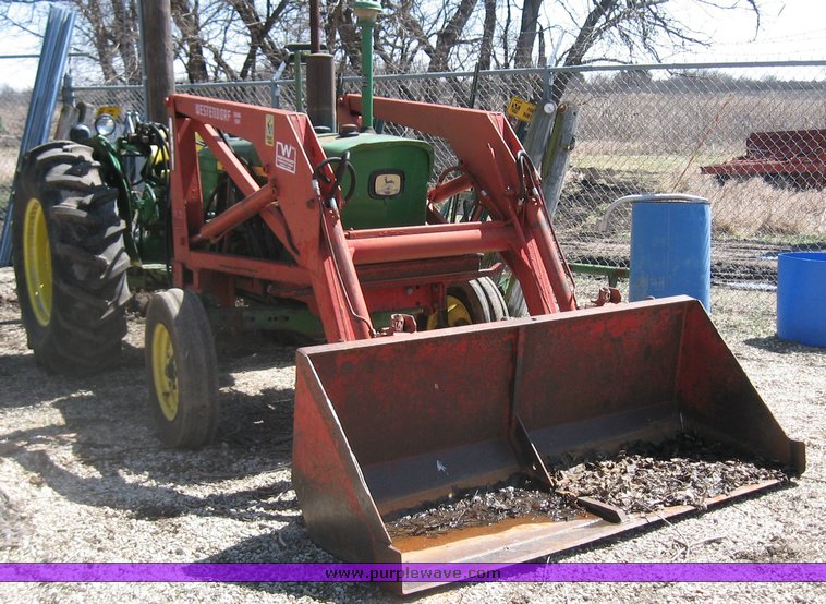 image for item 9183 1968 John Deere 2020 tractor with loader