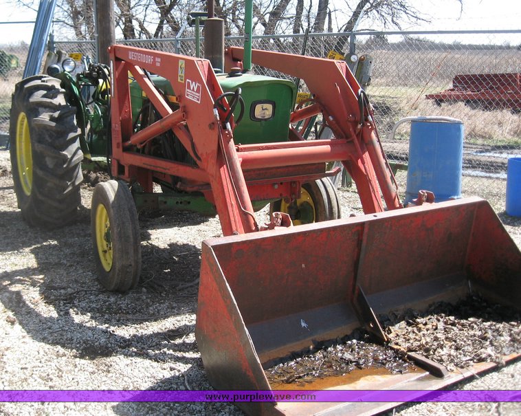 image for item 9183 1968 John Deere 2020 tractor with loader
