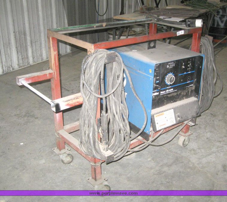image for item 6331 Miller Dialare 250 AC/DC welder with cart