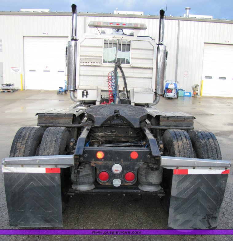 image for item 3106 2004 Freightliner Conventional Classic FLD120 semi truck