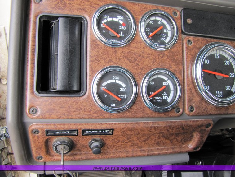 image for item 3106 2004 Freightliner Conventional Classic FLD120 semi truck