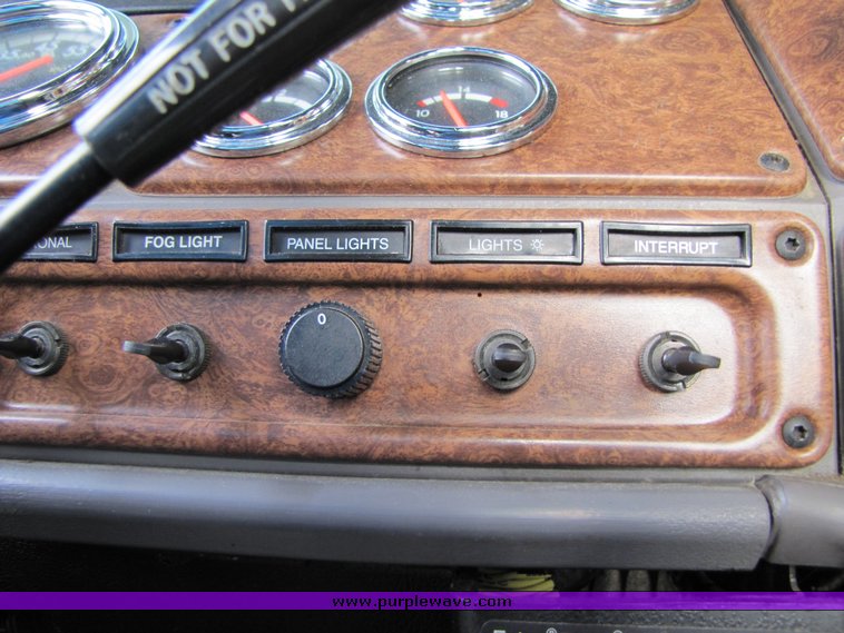 image for item 3106 2004 Freightliner Conventional Classic FLD120 semi truck