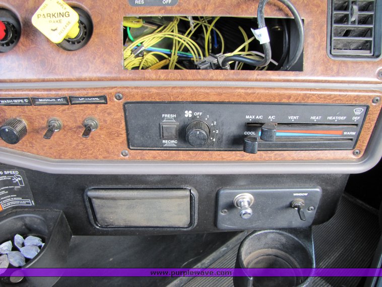 image for item 3106 2004 Freightliner Conventional Classic FLD120 semi truck