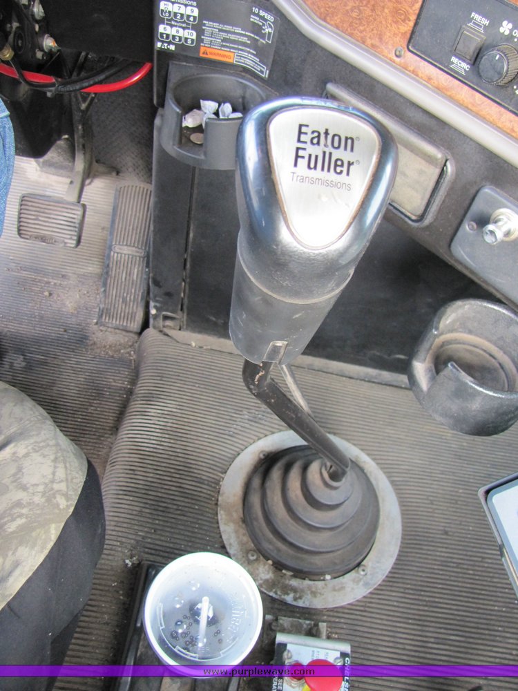 image for item 3106 2004 Freightliner Conventional Classic FLD120 semi truck