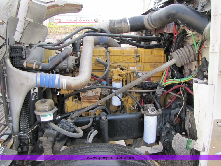 image for item 3106 2004 Freightliner Conventional Classic FLD120 semi truck