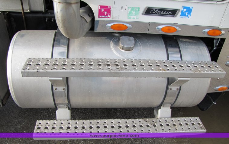 image for item 3106 2004 Freightliner Conventional Classic FLD120 semi truck