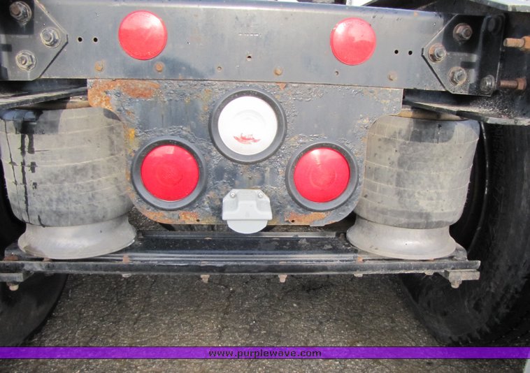 image for item 3106 2004 Freightliner Conventional Classic FLD120 semi truck