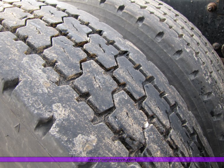 image for item 3106 2004 Freightliner Conventional Classic FLD120 semi truck