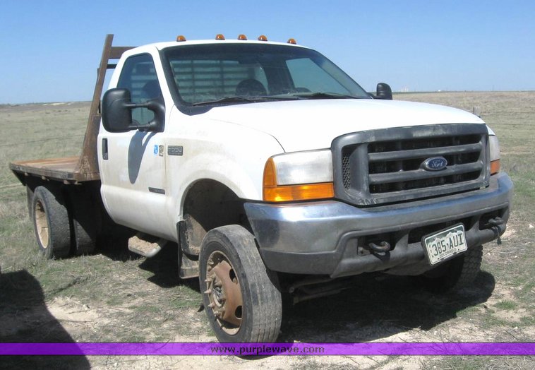 image for item 6213 2000 Ford F550 Super Duty flatbed pickup with gooseneck hitch