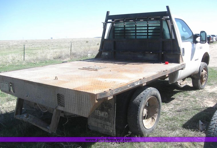 image for item 6213 2000 Ford F550 Super Duty flatbed pickup with gooseneck hitch