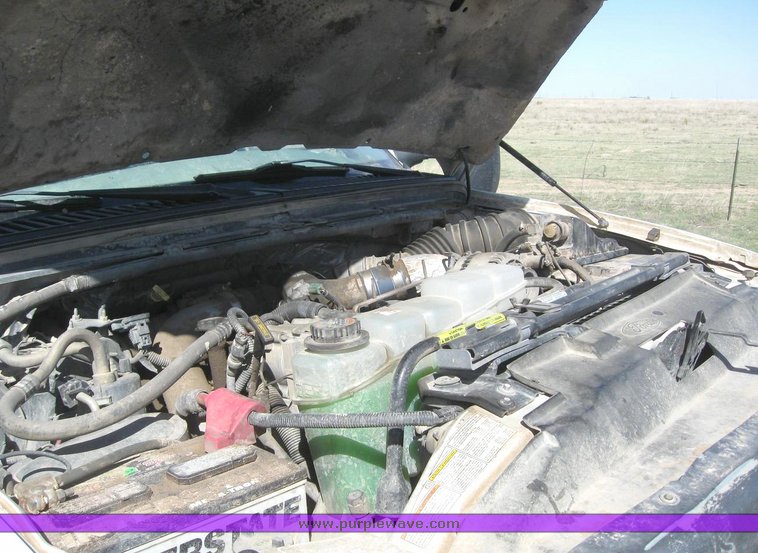 image for item 6213 2000 Ford F550 Super Duty flatbed pickup with gooseneck hitch