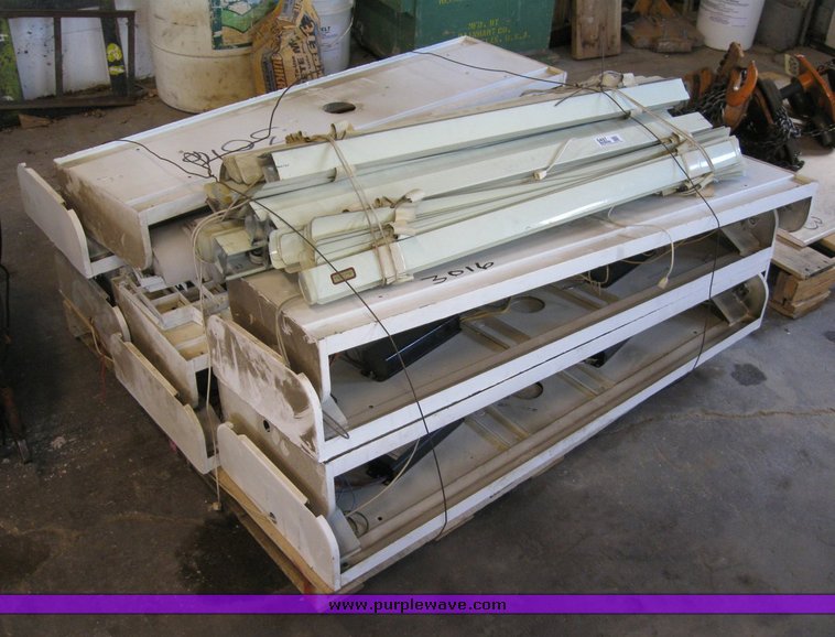 image for item 6497 (10) 4' four bulb fluorescent light fixtures