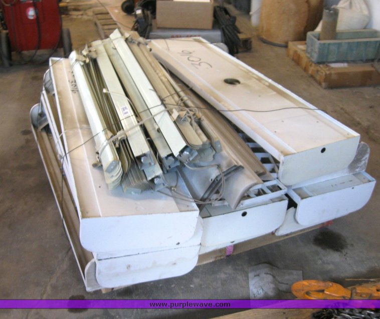 image for item 6497 (10) 4' four bulb fluorescent light fixtures