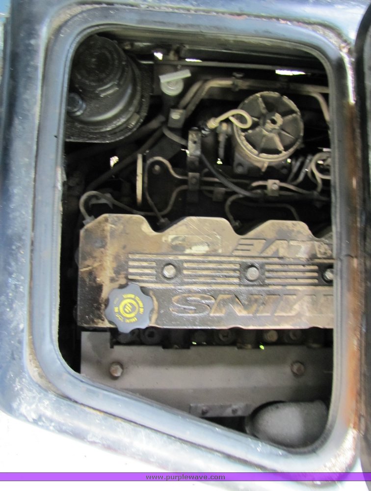 image for item 3115 2003 Thomas 65 passenger school bus