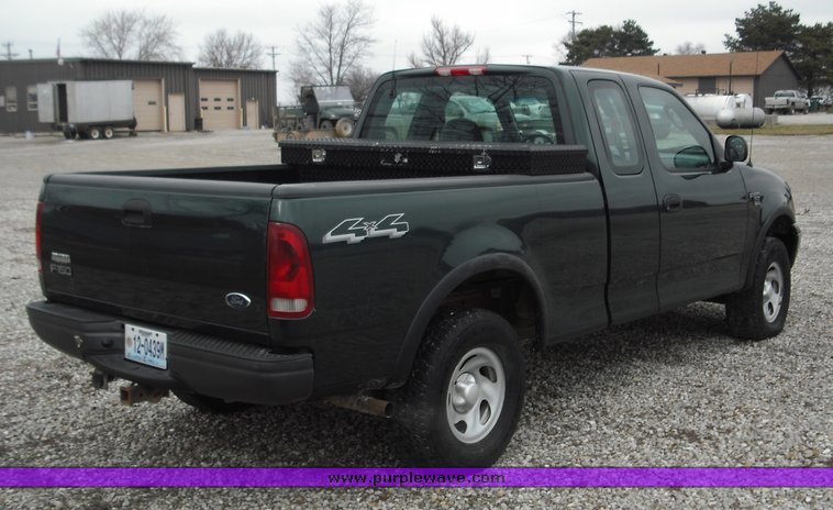 image for item 3279 2003 Ford F150 four door extended cab pickup